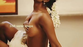 Bare-breasted Indian Beauty Draped In A Saree